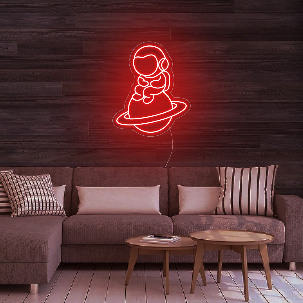 Astronaut Sitting on Planet Neon Signs