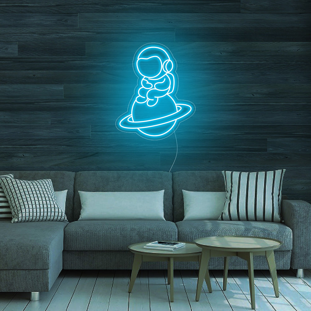 Astronaut Sitting on Planet Neon Signs